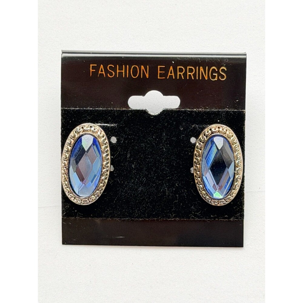 Vintage 1980s metal stud earrings, made in Korea, featuring oval-shaped faux sap